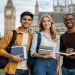 Alt text: Diverse postgraduate students on a UK university campus with London landmarks in the background, representing Integrated PhD Programs in the UK and international doctoral study opportunities.