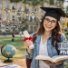 Smiling female PhD student on a university campus holding a diploma and research book, symbolizing preparation for a PhD with academic and research icons, ScholarLink.