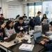 international students working in a robotics lab in Canada